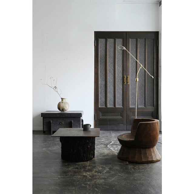 This is a chair made from a repurposed wooden mortar (usu), thought to have been made in Japan between the late Meiji and...