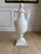 A truly monumental hand-carved Italian alabaster covered urn of exceptional scale and timeless neoclassical design....