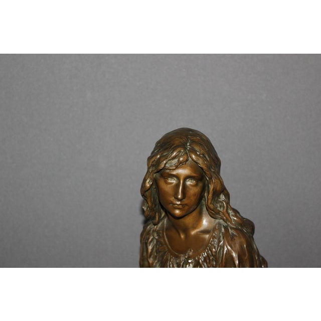 Bronze with brown patina, The Mandolin Player, by Paul Eugène Mengin (1853-1937), on its rotating griotte marble base,...