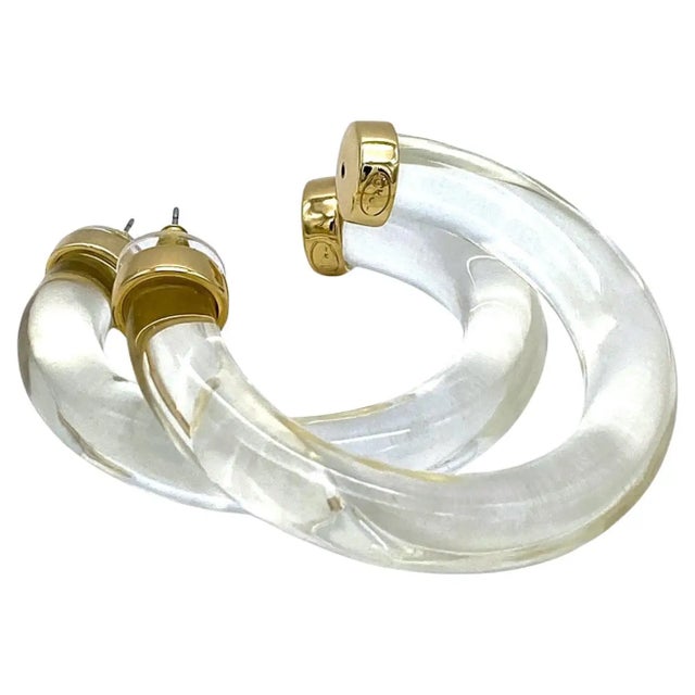 This pair of Kenneth Jay Lane clear lucite hoop post earrings is in great condition Like new! The KJL is stamped on gold...