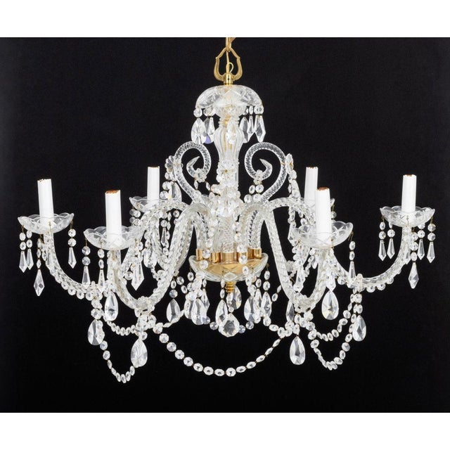 Georgian Style Six Branch Crystal Chandelier, with glass scrolled arms and faceted crystal drops. 31" H x 31" Diameter....