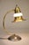 A rare and striking Art Deco Streamline styled solid Brass "Halo" Milk glass shade design lamp designed and manufactured...
