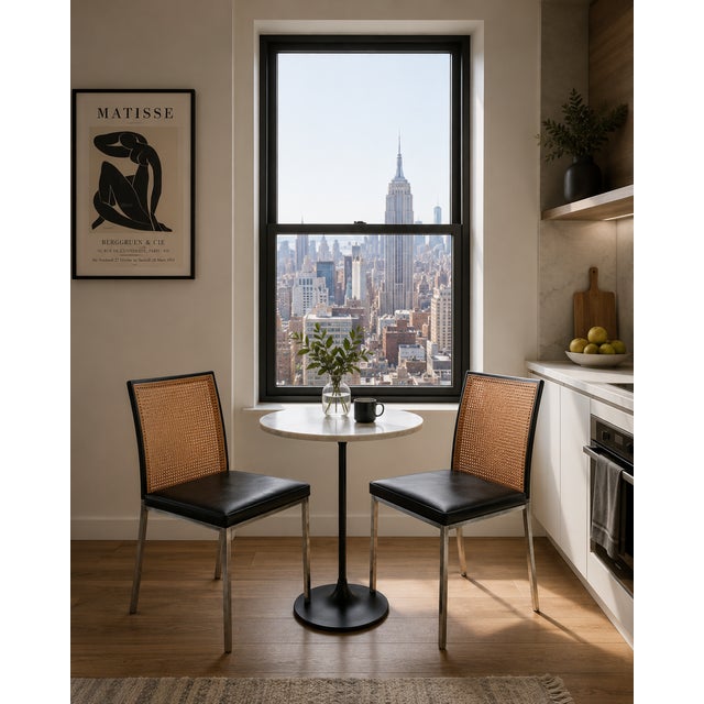 A Pair of Chrome and Wicker Caned Dining Chairs or Side Chairs Perfect used in a Living Room, Den, or Home Office. Could...