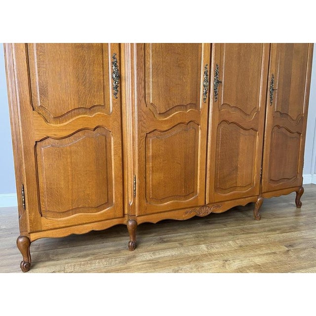 Brown Vintage French Louis XVI Style Carved Oak 4-Door Armoire For Sale - Image 8 of 14