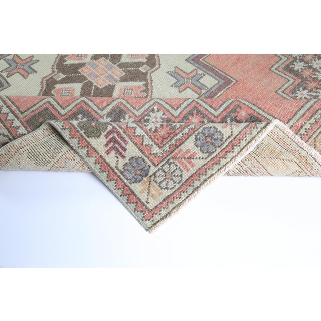 Vintage Tribal Turkish Rug in Soft Peach & Neutrals - Boho Turkish Medallion Rug With Graphic Borders -4' 3'' X 8' 5'' For Sale - Image 9 of 9