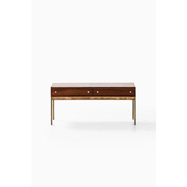 Rare side table attributed to Poul Nørreklit. Produced in Sweden.