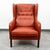 Outstanding top grain red leather wingback lounge chair. This piece comes in a rich and high quality leather. This chair...