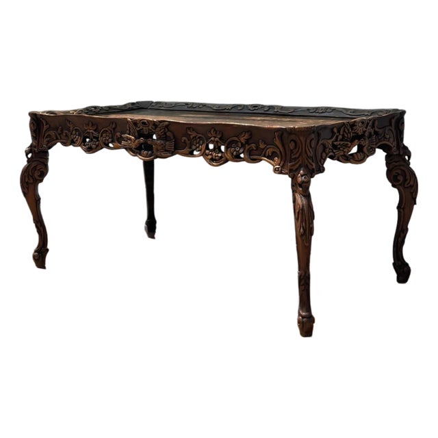 Early 20th Century Spanish Revival Carved Walnut Coffee Table With Bird Motif, Baroque Style For Sale