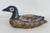 This beautiful Duck Statue is made of brass plating and ceramic. This gorgeous mixed medium decorative duck presents the...
