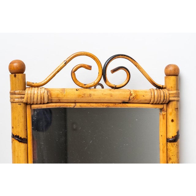 Bamboo mirror, Made in Italy, 1970s. Beautiful handmade mirror made of bamboo and rattan. It is in excellent condition and...