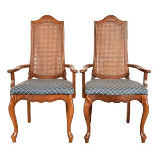 Baker Furniture Style French Provincial Louis XV Carved Walnut and Cane Back Armchairs, Pair For Sale