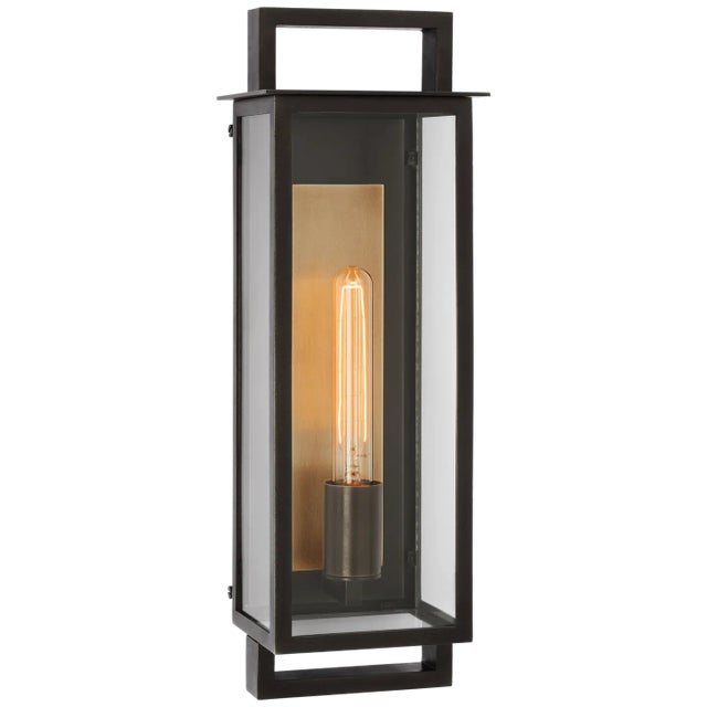 Halle Medium Narrow Wall Lantern in Aged Iron with Clear Glass Designer: Ian K. Fowler Height: 19" Extension: 5.75"...