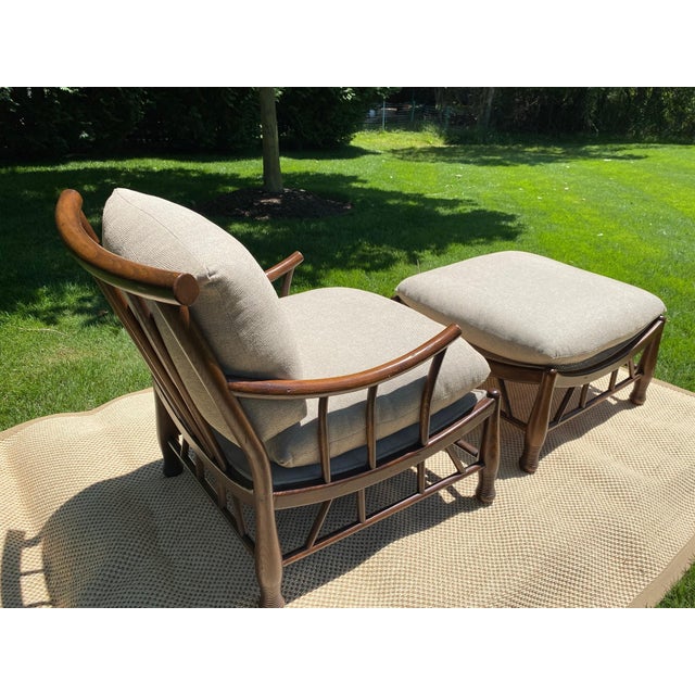 Thebes Chair & Ottoman by Pearson, A Set The Thebes Chair and Ottoman in sculptural Chestnut subtly channels the mystique...