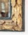 Elegant mirror in carved Swiss pine wood gilded with pure gold leaf, painted in a shade of antique green. The frame is...