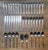 A 42 piece set of "Odin" stainless steel flatware designed by Jens Quistgaard in Denmark for Dansk. Designed in Denmark,...