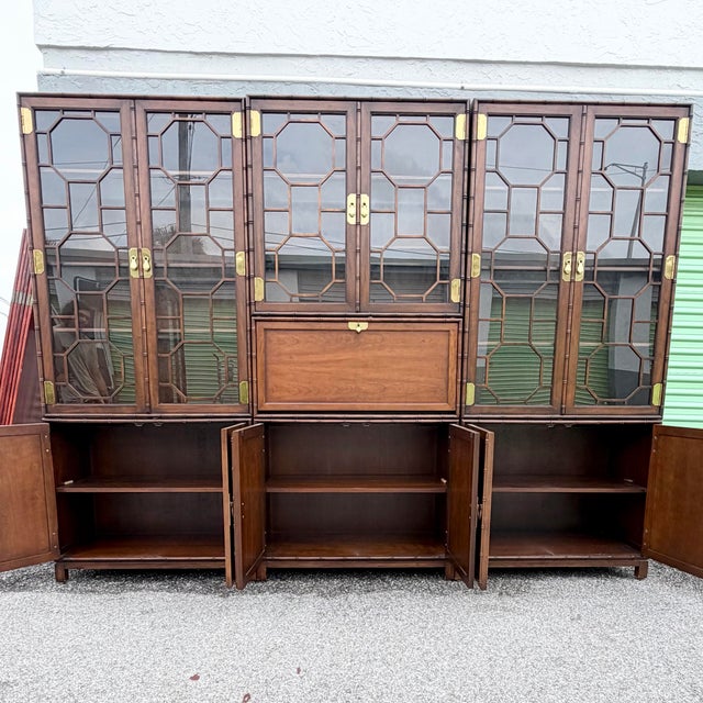 Each piece: 38”w This vintage modular wall unit by Baker Knapp Tubbs blends campaign styling with elegant chinoiserie...