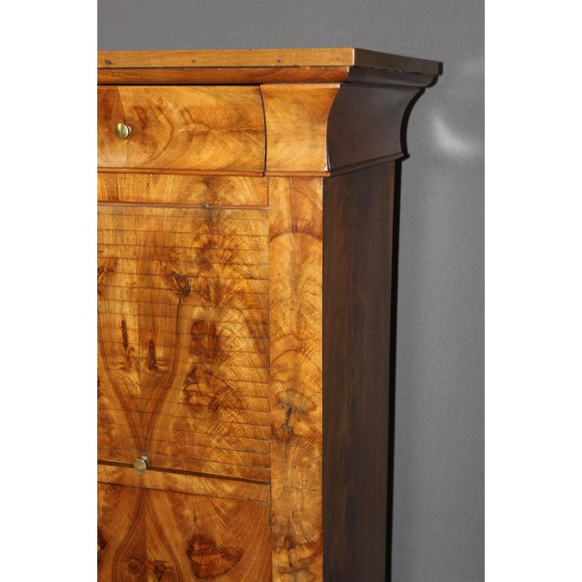 Restoration period bedside table in walnut, opening with a drawer, a curtain and a door, waxed finish, 19th century, in...