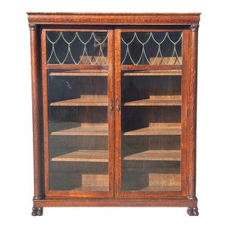 Antique Victorian Tiger Oak Double Door Bookcase With Shield Formed Leaded Glass For Sale