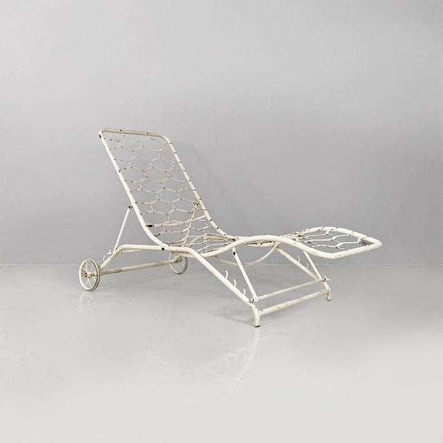 Italian mid-century modern white iron garden deck-chair or chaise longue, 1960s. Deck chair or garden chaise longue, in...