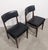Mid-century skaï office or lounge chair Set of two office or lounge chairs. Black faux leather seats. Excellent condition.