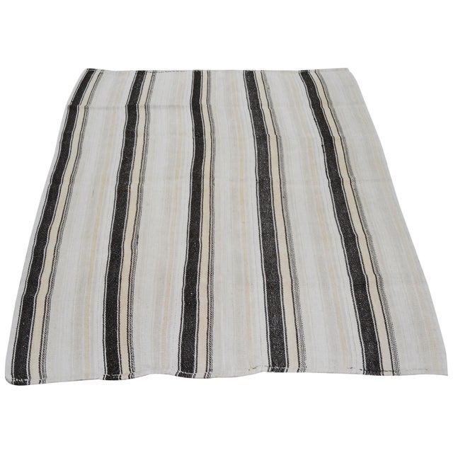 Flatweaved with care using traditional rug-making techniques, this hemp rug blends timeless craftsmanship with a modern...