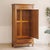 A single-door mirrored wardrobe in oak, crafted in the louis xvi revival style around 1900. The narrow front is clearly...