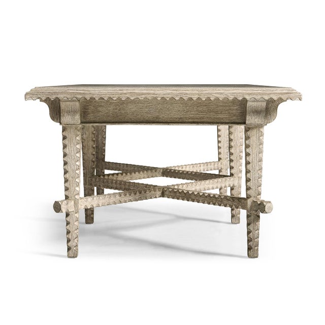 Featuring tramp-style carvings that add a touch of artisanal detail, this table showcases a greyed oak finish for a...
