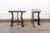 A charming Italian pair of carved wood demi-lune tables from the 19th century. These smaller-sized antique consoles from...