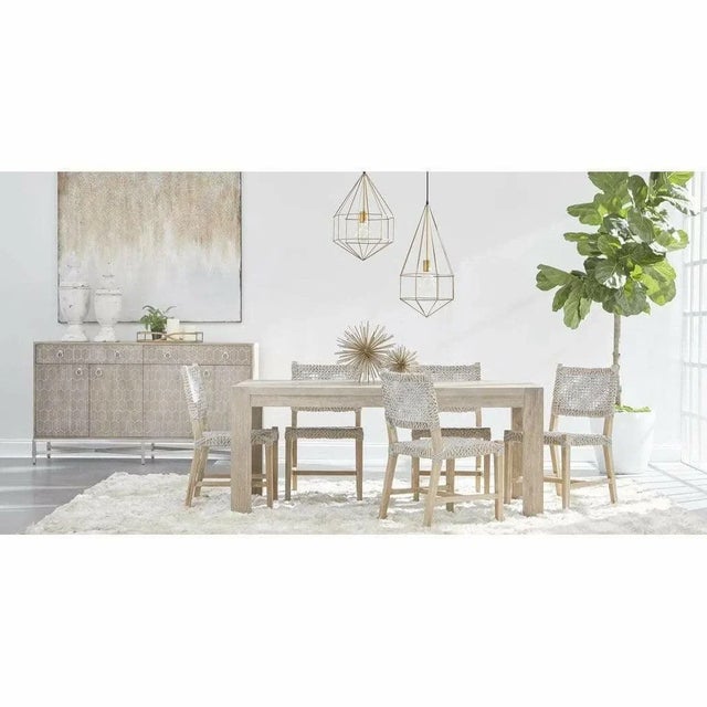 This 71-102" solid acacia wood extendable dining table brings warm, rustic character to your dining space with its natural...