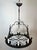 This round 8-light chandelier is made of wrought iron. It is a French Gothic-style work. Circa 1950