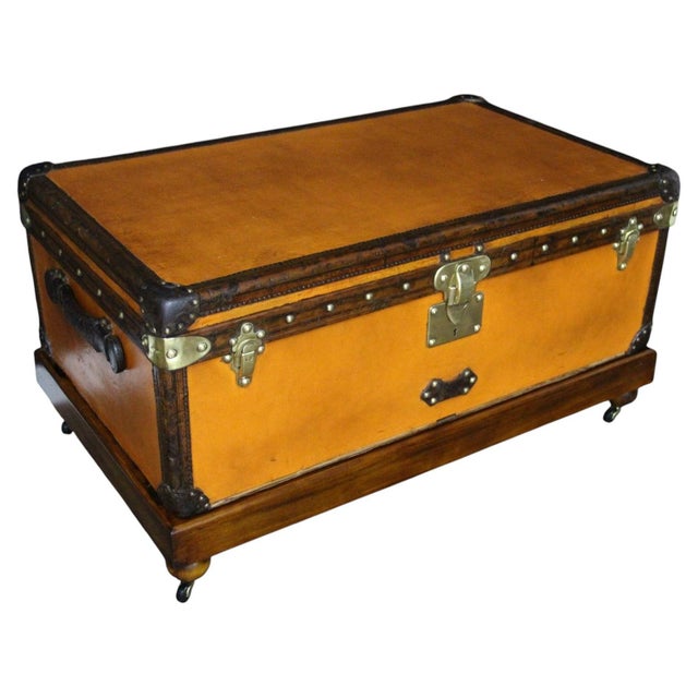 This exceptional Louis Vuitton trunk is distinguished by its superb orange canvas, its full chocolate-colored leather...