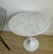 Round 20" Tulip side table designed by Eero Saarinen for Knoll. Executed in white Carrara Italian marble and cast iron...