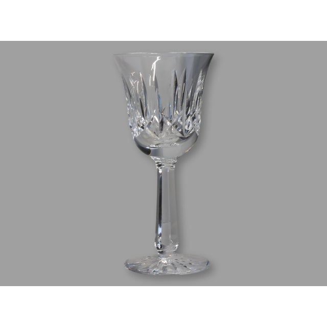 Mid 20th century Waterford crystal wine goblets in the Ballyshannon pattern, featuring deep wedge and fan cutting that...