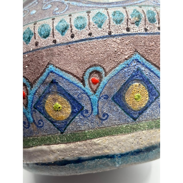 A stunning large volcanic lava glaze pottery ever most likely Italian. Vibrant, colorful and beautifully executed, the...