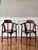 Pair of midcentury Chinese rosewood corner chairs. Beautifully formed, sculptural chairs with detailed mother-of-pearl...