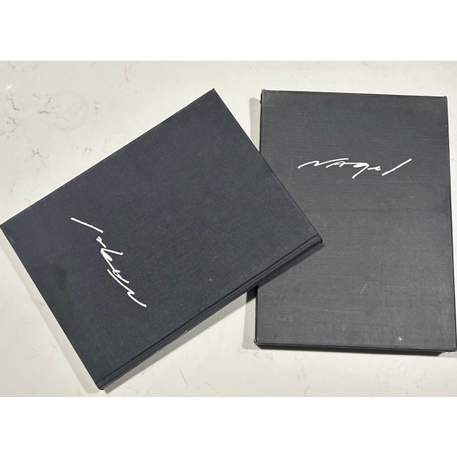 This first edition Deluxe Edition of Patrick Nagel's art is like having the 1980's in a sleek black cloth covered box....