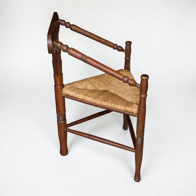 English Early 20th Century Dutch Corner Oak Chair With Rush Seat, Sculptural Triangular Form For Sale - Image 3 of 6