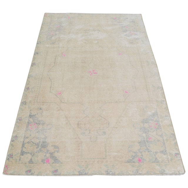 Hand-knotted with care using traditional rug making techniques, this wool rug blends timeless craftsmanship with a modern...