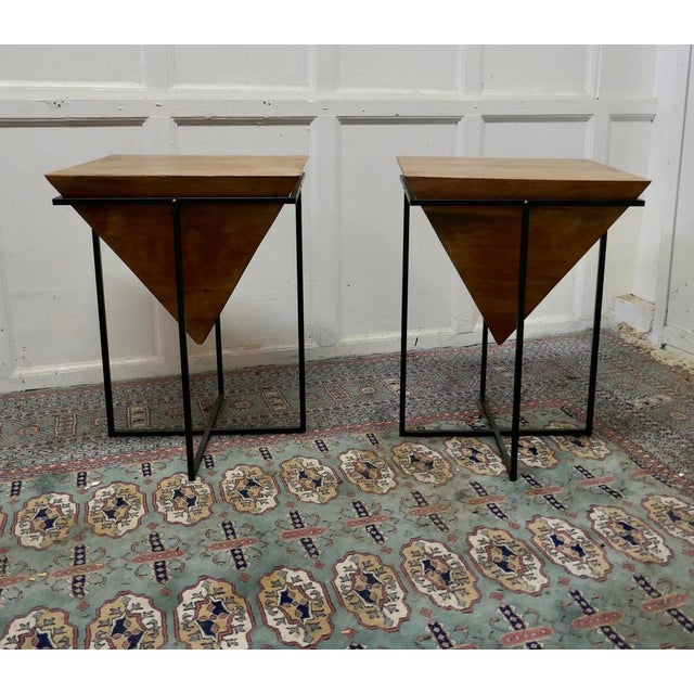 A pair of inverted pyramid occasional tables The tables are made from very precisely cut fruit wood in a pyramid shape...