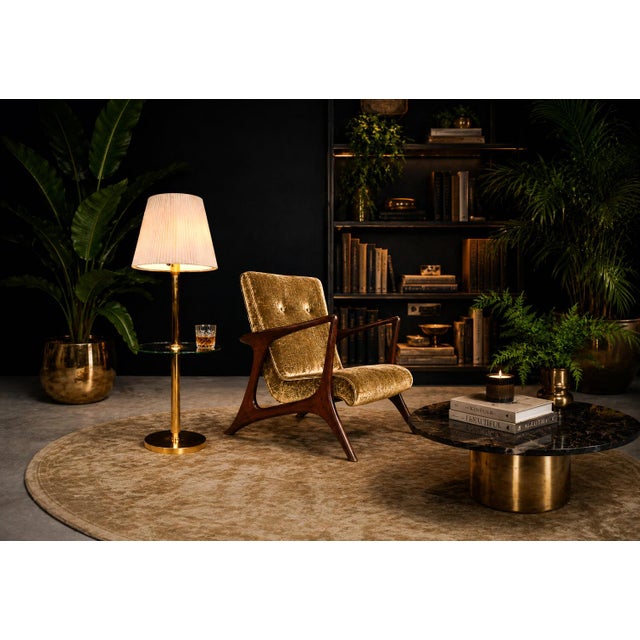 A rare and highly sculptural Brazilian production attributed to Vladimir Kagan, executed in richly figured rosewood and...