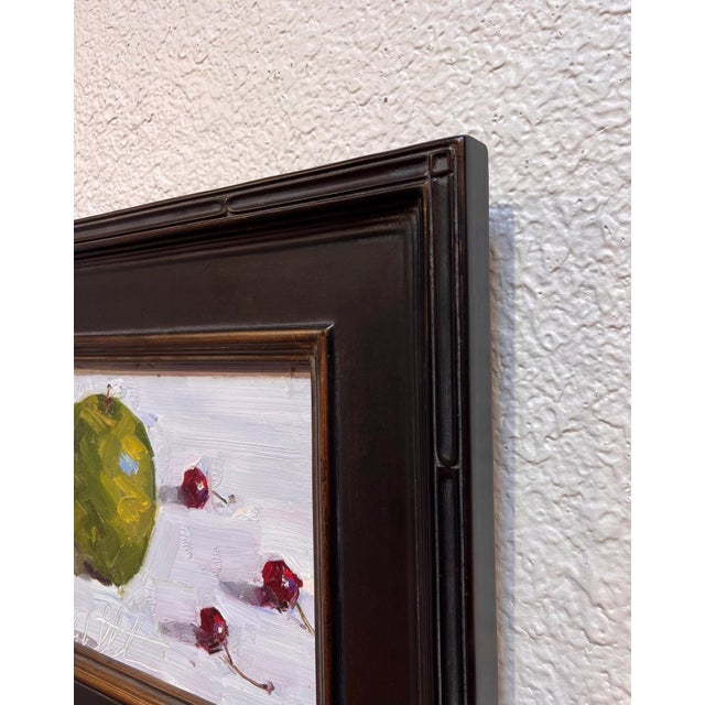 Contemporary Apples and Cherries by Clyde Steadman | Oil Painting of an apple and cherries on a surface For Sale - Image 3 of 3