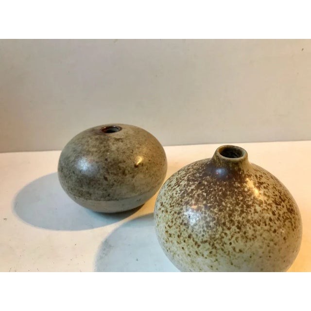 A uneven set of earthy glazed pottery vases designed by danish ceramist Aage Würtz and manufactured at his own workshop -...