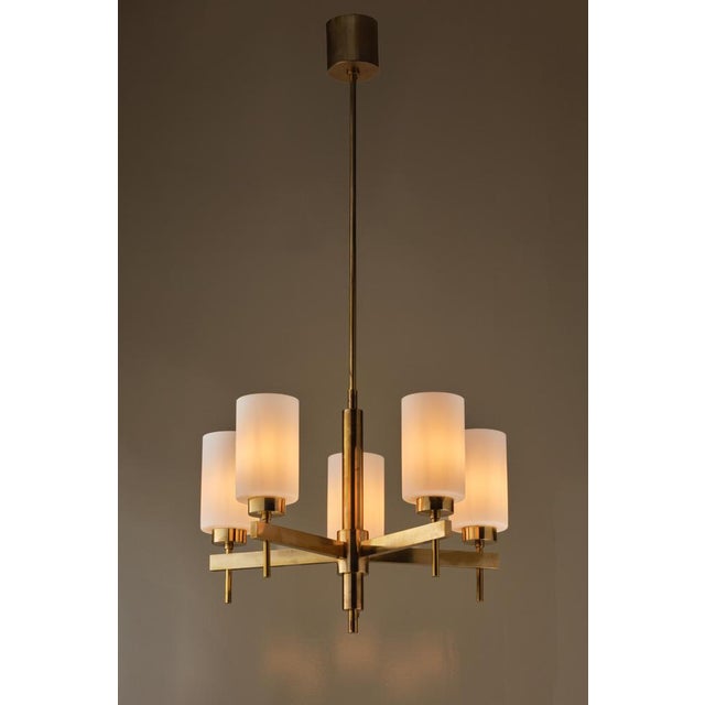 Opaline glass and brass. Designed by Hans-Agne Jakobsson and produced by Hans-Agne Jakobsson AB in Markaryd, Sweden,...