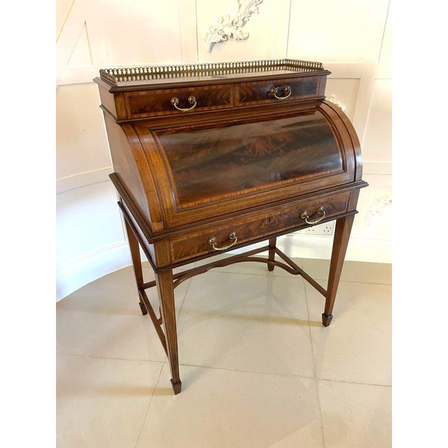 Fine quality antique edwardian freestanding mahogany inlaid cylinder desk by maple & co. London having the original brass...