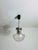 A stunning glass hanging lamp made in Germany in the 1970s. This elegant light fixture features exquisite Murano glass,...