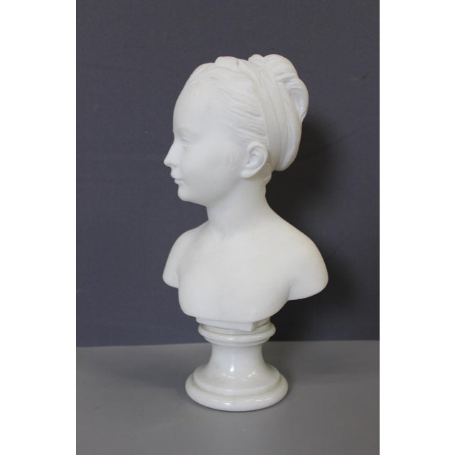 Bust of a young woman on a rotating base, depicting Marie Louise Brongniart after Houdon in white Carrara marble, height...