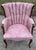 A beautiful pink floral damask fabric chair with channel back tufting and Queen Anne front legs. The pretty pink hue leans...