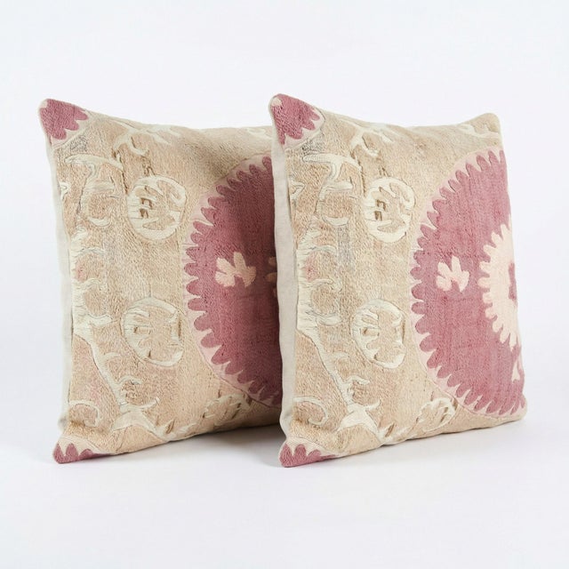 This beautiful 16'' x 24'' hand-embroidered Suzani pillow cover set was made from authentic Uzbek cotton fabric. The...