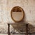 Add refined decorative elegance to your space with this 19th century French round wooden mirror, a beautifully crafted...