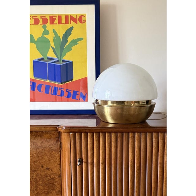 Mid-century brass table lamp Rumi Italy, 1960s Brass base, opaline glass H 33 cm x 35 cm diam. Conditions: excellent, no...